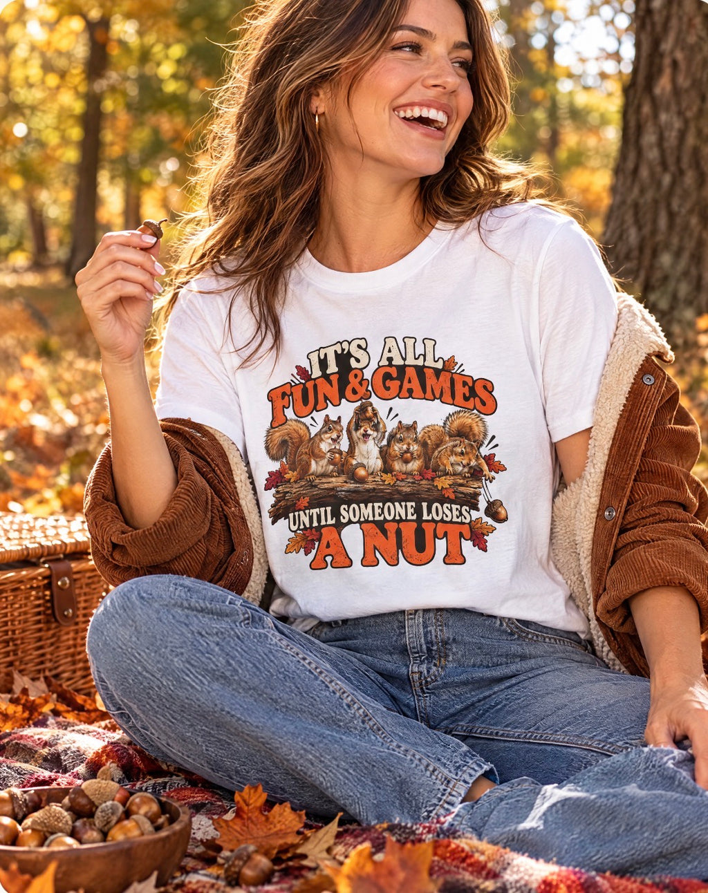Lifestyle mockup of the It's All Fun & Games Until Someone Loses a Nut fall squirrel T-shirt.
