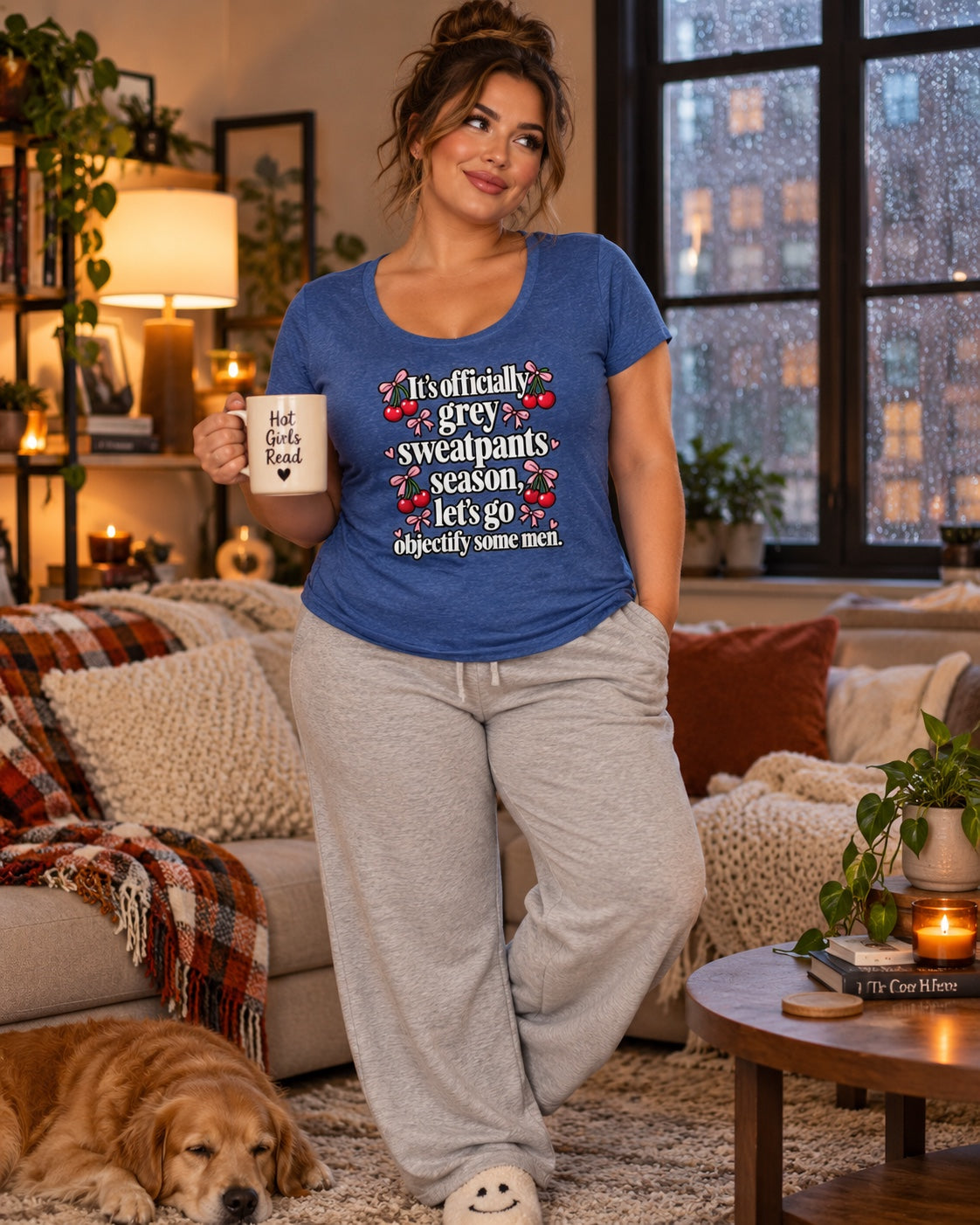 Grey Sweatpants Season scoop neck tee in a cozy rainy-day living room