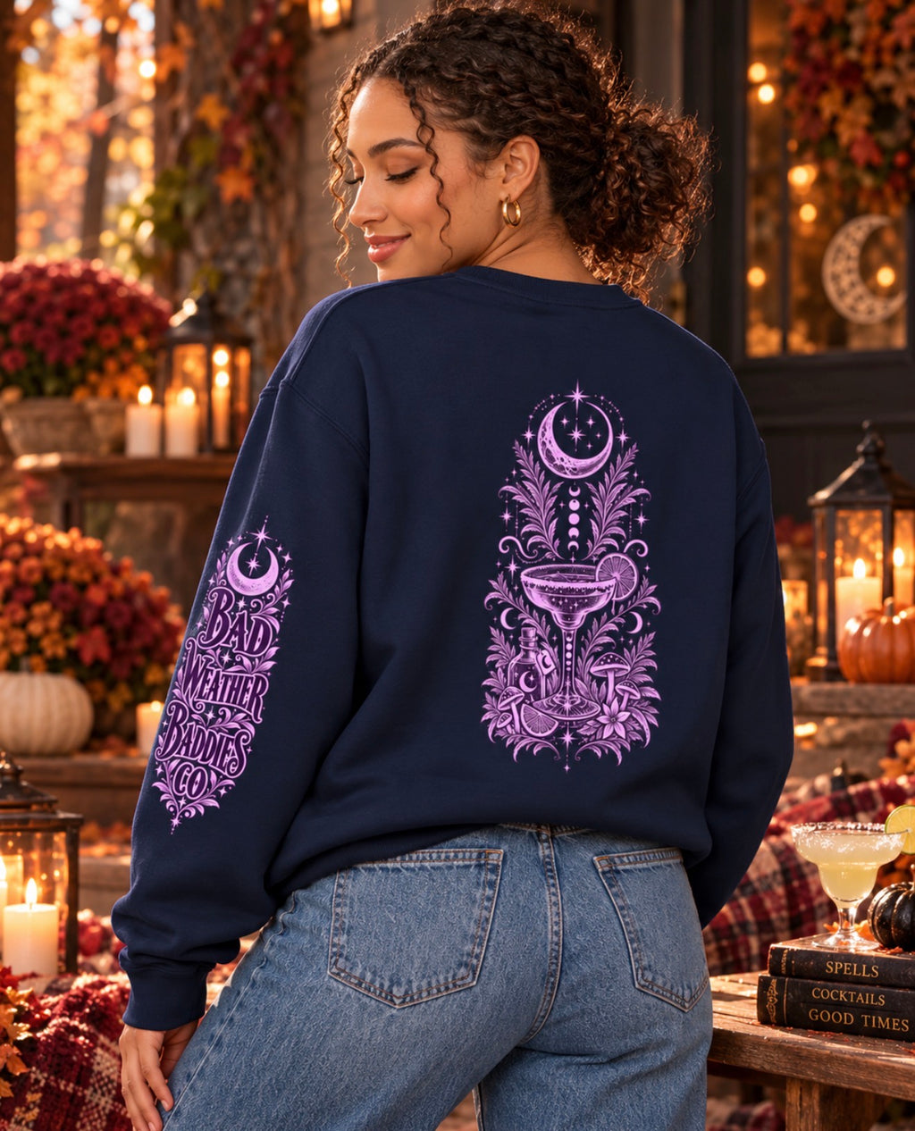 Back view of Moonlit Margaritas crewneck sweatshirt with celestial cocktail artwork and Bad Weather Baddies sleeve design
