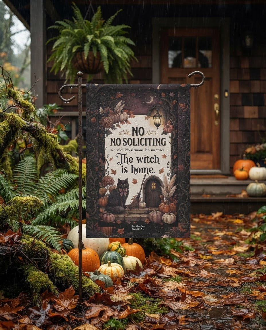 No Soliciting witch garden flag on a rainy Pacific Northwest autumn porch