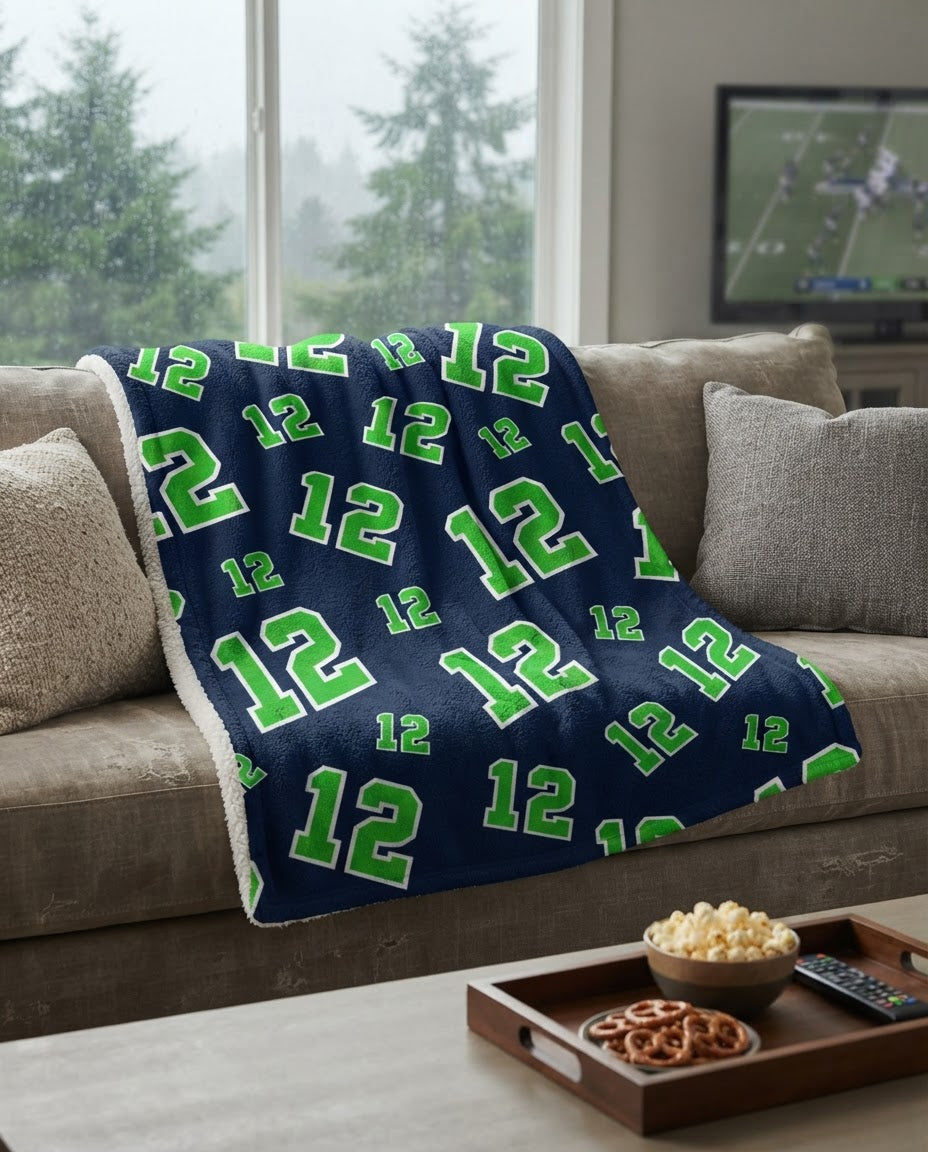 Navy and bright green number 12 sherpa blanket in a cozy rainy game-day living room