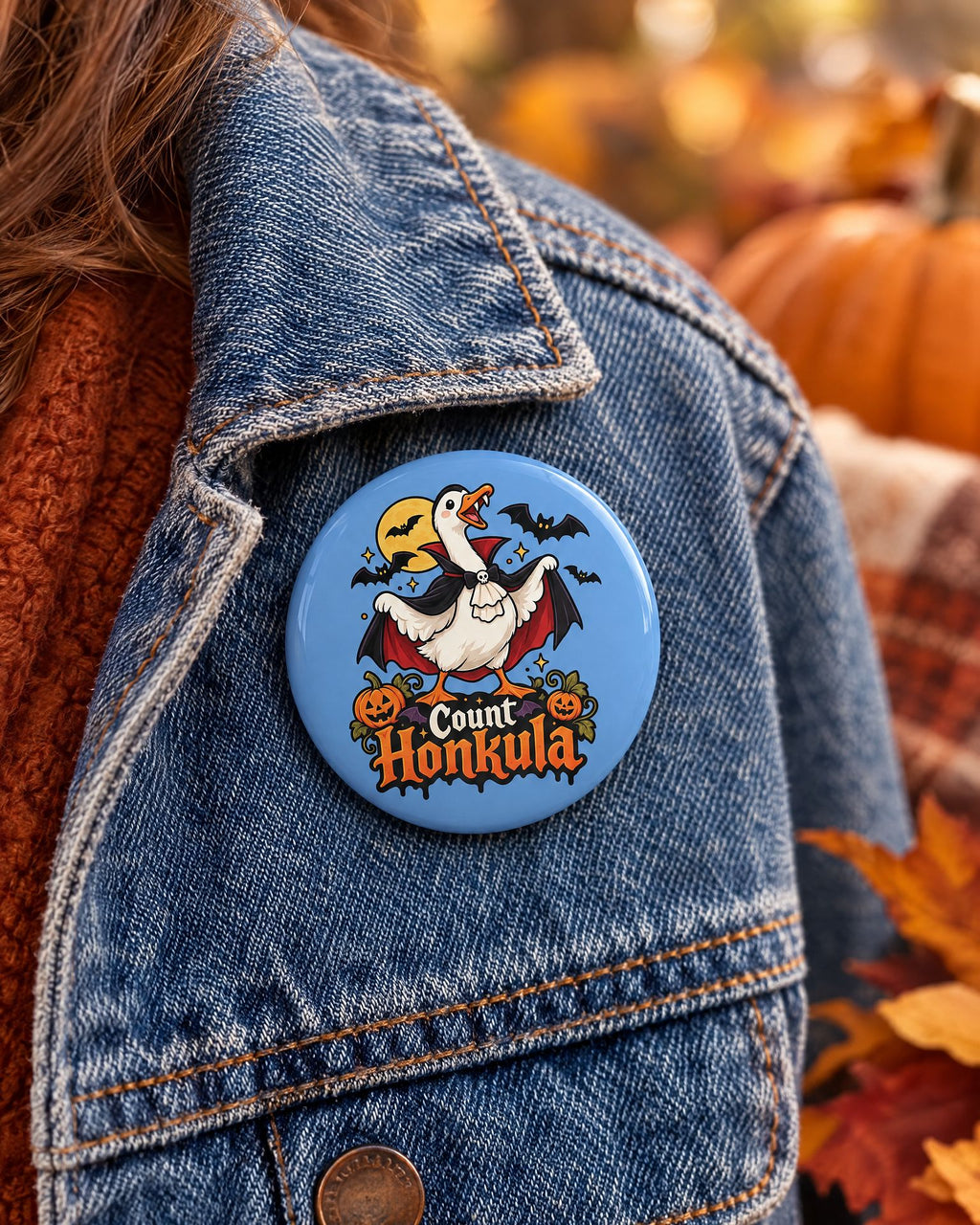 Lifestyle hero mockup for Count Honkula 3 Inch Halloween Vampire Goose Pin.